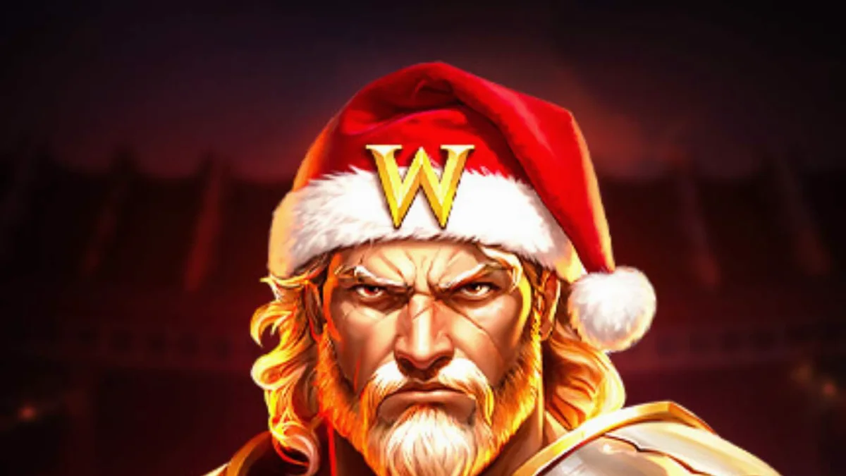Gambar layar permainan slot Frosty Rage menampilkan gladiator bertopi Santa dan kaisar Romawi di latar belakang musim dingin.